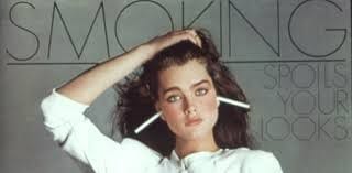 Brooke Shields with cigarettes sticking out of her ears